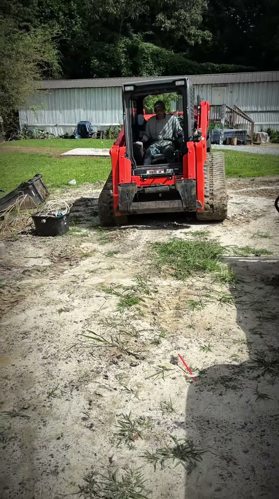 Our skid steer grading a home site